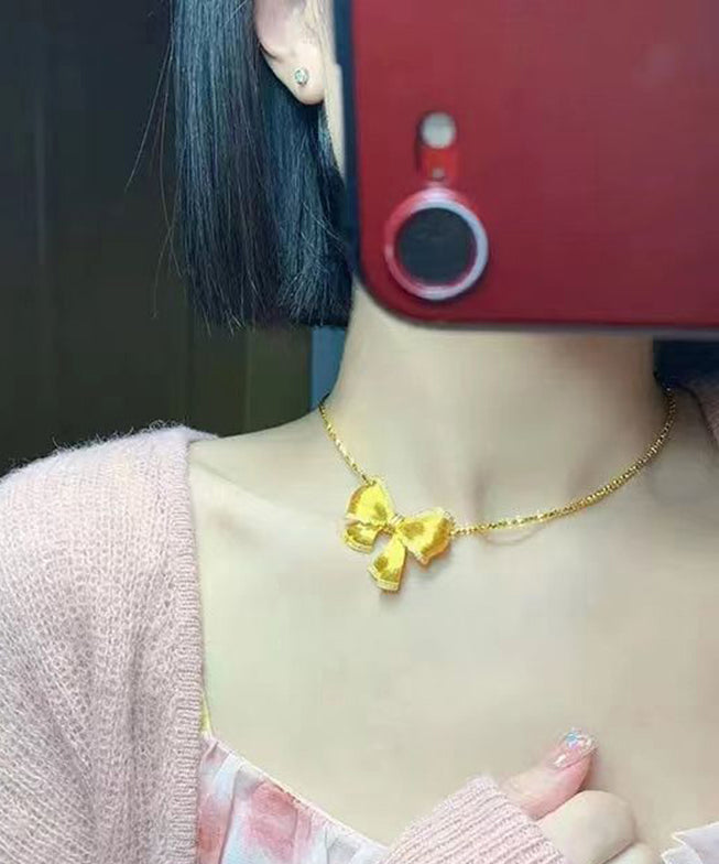 Elegant Gold Bow Zircon Pendant Necklace