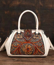 Retro Apricot Colored Cowhide Handmade Carved Handbag