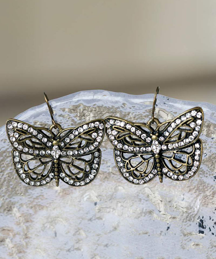 Retro White Metal Zircon Butterfly Hollow Out Stud Earrings