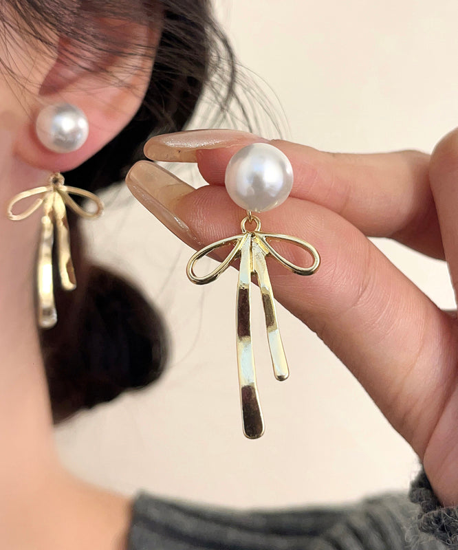 Unique Silk Sterling Silver Metal Pearl Bow Drop Earrings