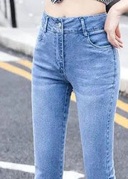 Klassische, blaue, schmal geschnittene, hoch taillierte, bestickte Baumwoll-Denim-Flare-Hose für den Sommer