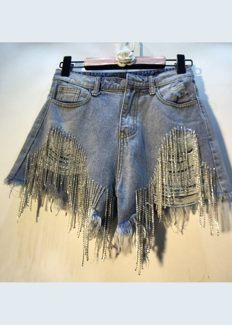 Schmal geschnittene, blaue, asymmetrische Design-Quasten-Diamant-Baumwoll-Denim-Shorts